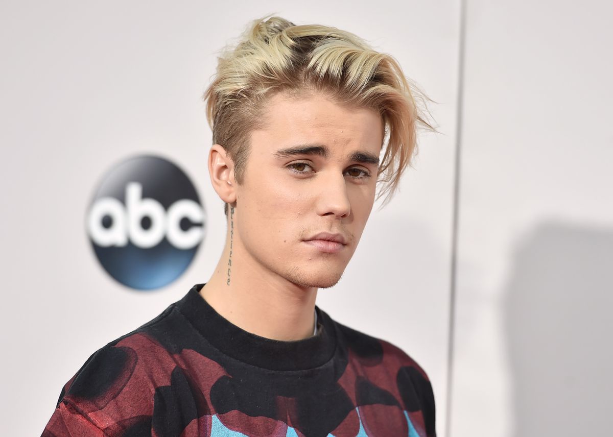 FILE - In this Sunday, Nov. 22, 2015 file photo, Justin Bieber arrives at the American Music Awards at the Microsoft Theater in Los Angeles. With his recent batch of hit singles and semi-grown-up sound  - including the electro-pop "Where Are U Now" with DJ-producers Skrillex and Diplo - adult men have begun attending the church of Bieber, and while some have issues admitting it, other proudly say they are Beliebers. Sorry and What Do You Mean, currently at Nos. 2 and 4 on Billboards Hot 100 chart, helped Bieber solidify his comeback after years of a broken image, which included arrests, public smoking and fainting onstage that led to hospitalization. (Photo by Jordan Strauss/Invision/AP, File) (Jordan Strauss/invision/ap)