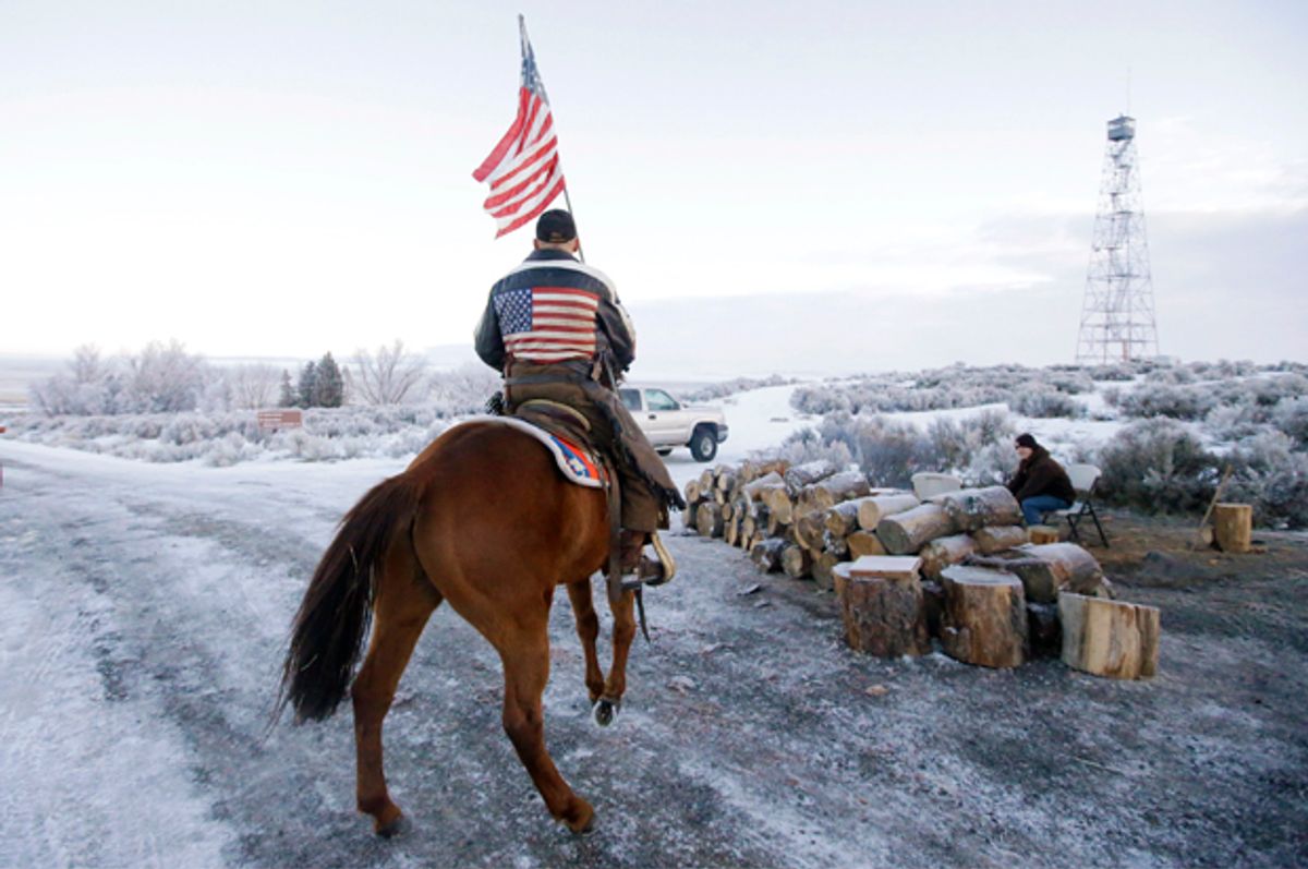 Cowboy Dwane Ehmer, of Irrigon Ore., a supporter of the group occupying the Malheur National Wildlife Refuge, rides his horse at Malheur National Wildlife Refuge Friday, Jan. 8, 2016, near Burns, Ore.   (AP/Rick Bowmer)