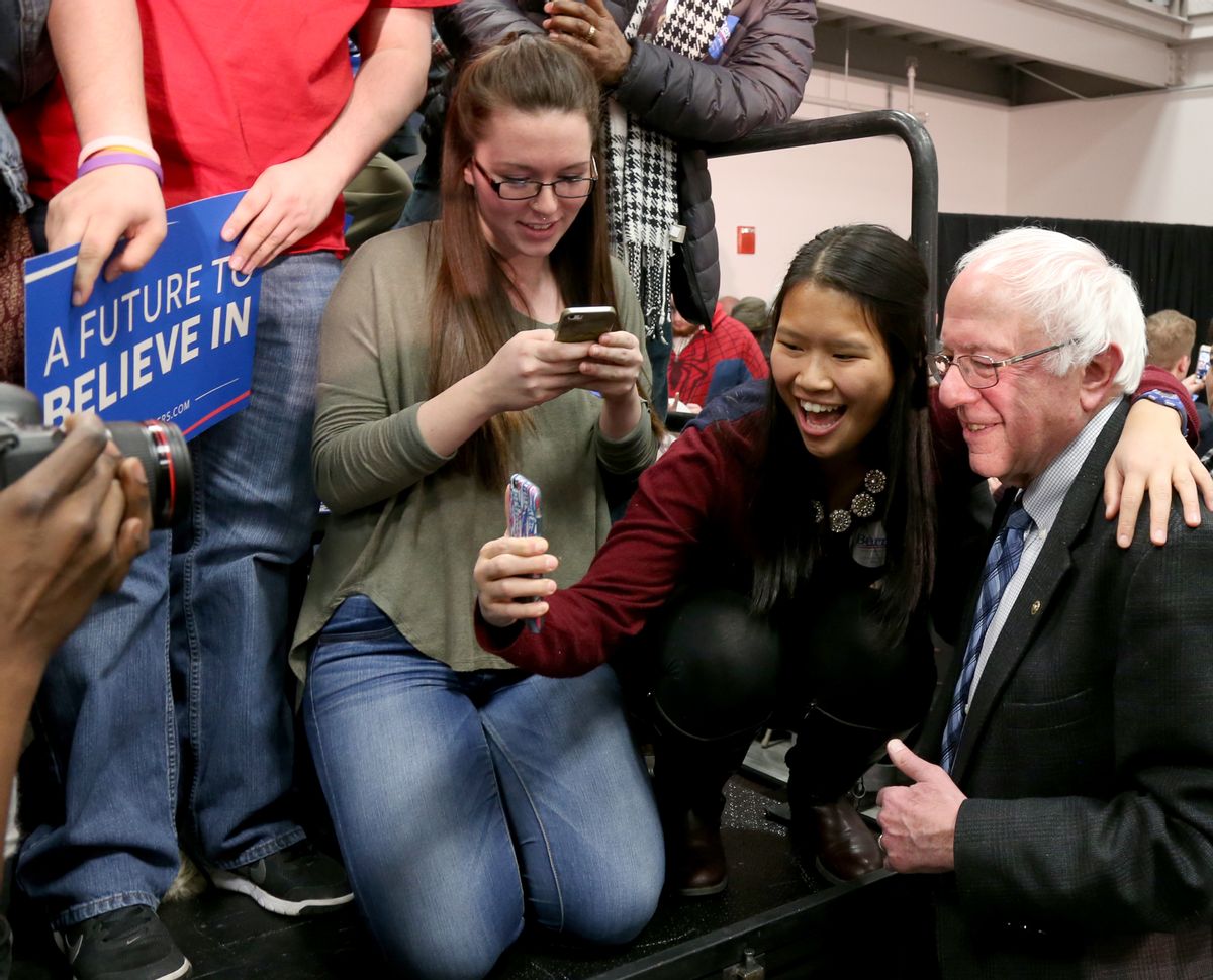 Democratic presidential candidate Sen. Bernie Sanders, I-Vt., poses for photos during a campaign stop, Monday, Jan. 4, 2016, in Manchester, N.H. (AP Photo/Mary Schwalm) (AP)