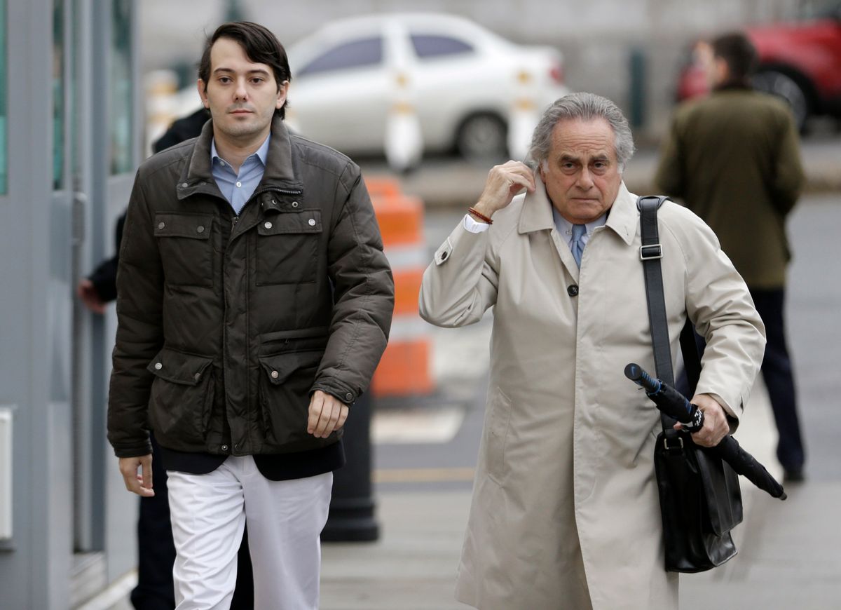 Former Turing Pharmaceuticals CEO Martin Shkreli, left, and his new lawyer Benjamin Brafman arrive at court in New York, Wednesday, Feb. 3, 2016.  (AP)