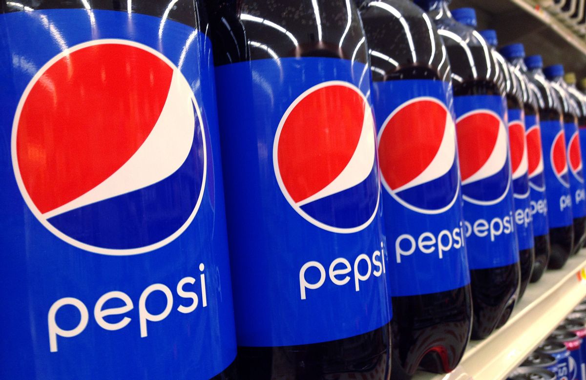 In this July 9, 2015, file photo, Pepsi bottles are on display at a supermarket in Haverhill, Mass. PepsiCo reports financial results Thursday, Feb. 11, 2016. (AP Photo/Elise Amendola, File) (AP)