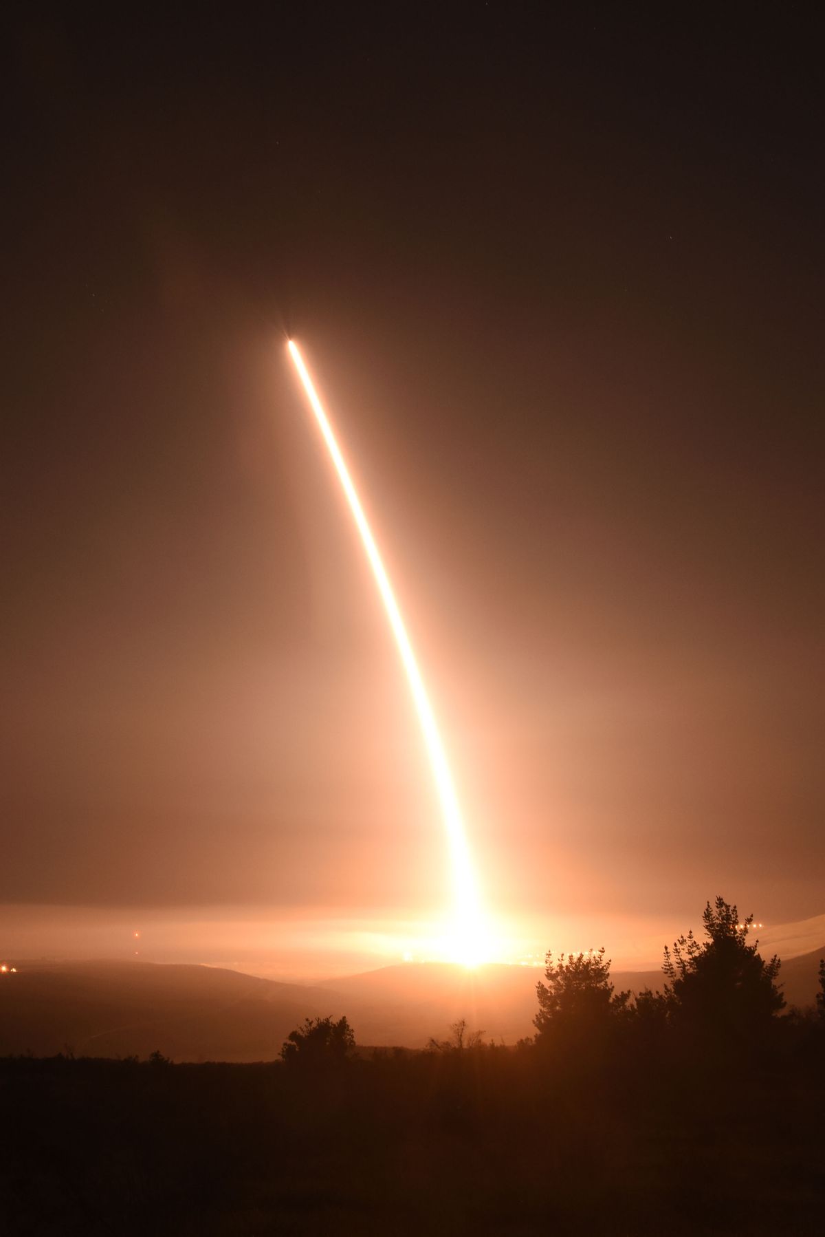 This Thursday, Feb. 25, 2016 photo provided by the U.S. Air Force shows an unarmed Minuteman 3 intercontinental ballistic missile launches during an operational test from Vandenberg Air Force Base, Calif. The unarmed missile roared out of its underground bunker on the California coastline and soared over the Pacific, inscribing the signature of American power amid growing worry about North Korea's pursuit of nuclear weapons capable of reaching U.S. soil.(Staff Sgt. Jim Araos/U.S. Air Force via AP) (AP)