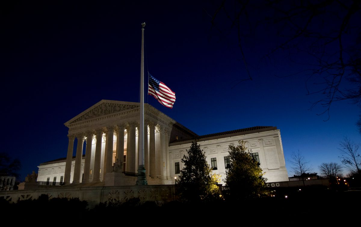 An American flag flies at half-staff in front of the U.S. Supreme Court building in honor of Supreme Court Justice Antonin Scalia as the sun rises in Washington, Sunday, Feb. 14, 2016. Scalia, the influential conservative and most provocative member of the Supreme Court, has died. He was 79. (AP Photo/Manuel Balce Ceneta) (AP)