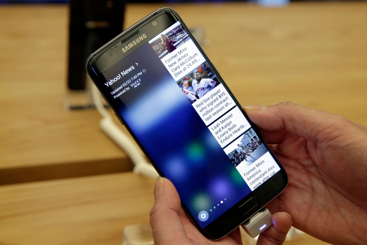 A Samsung Galaxy S7 Edge mobile phone is displayed during a preview of Samsung's flagship store, Samsung 837, in New York's Meatpacking District, Monday, Feb 22, 2016. Samsung is opening what it calls a "technology playground" in New York for customers to check out its latest gadgets. The center opens Tuesday, the day Samsung starts taking orders for its upcoming Galaxy S7 and S7 Edge phones. (AP Photo/Richard Drew) (AP)