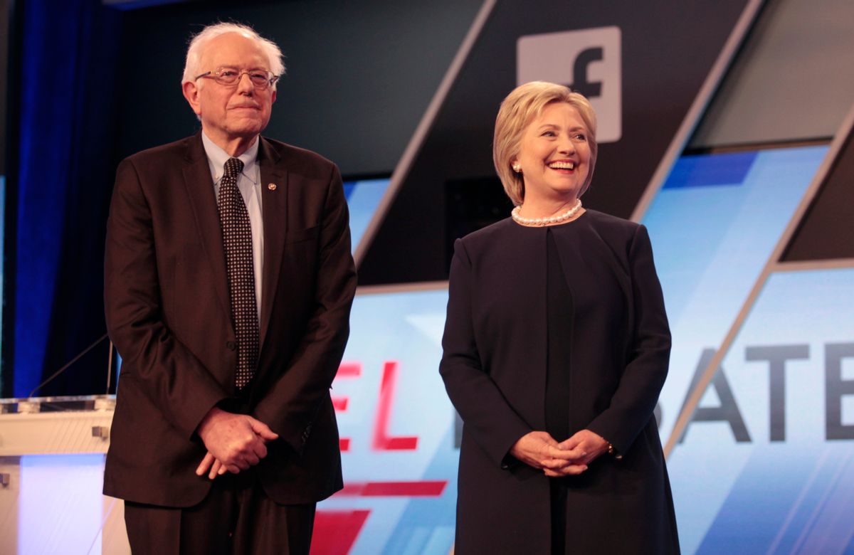 Bernie Sanders and Hillary Clinton before the start of  their debate in Kendall, Florida  (Reuters)