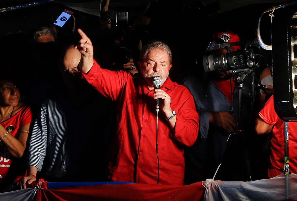 Brazil's former President Luiz Inacio Lula da Silva speaks during a rally in support of him and Brazil's President Dilma Rousseff, in Sao Paulo, Brazil, Friday, March 18, 2016. Supporters of Silva, who was one of the world's most famous leaders as president from 2003 to 2010, gathered for rallies in a handful of cities across Brazil, particularly in the industrial south, where the former factory worker has his base. Silva has been tied to a sprawling corruption investigation involving the Brazil oil giant Petrobras. (AP Photo/Andre Penner) (AP)