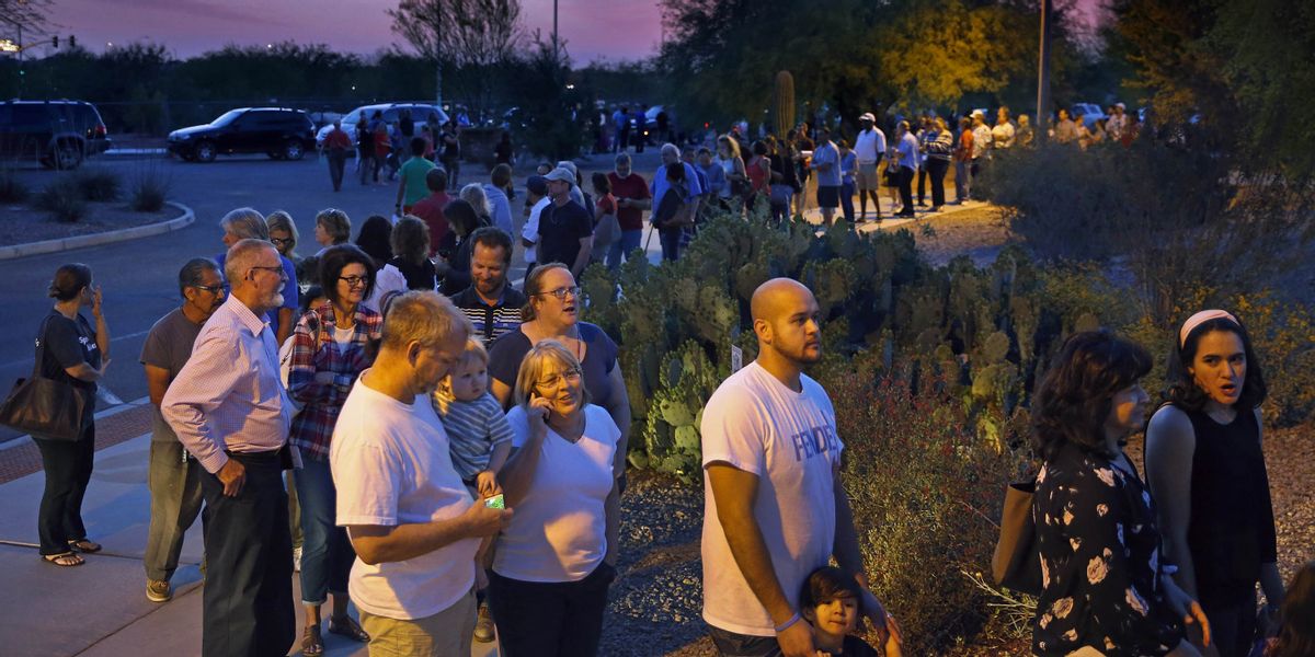 People wait in line to vote in the primary at the Environmental Education Center, Tuesday, March 22, 2016, in Chandler, Ariz. (David Kadlubowski/The Arizona Republic via AP)  MARICOPA COUNTY OUT; MAGS OUT; NO SALES; MANDATORY CREDIT (AP)