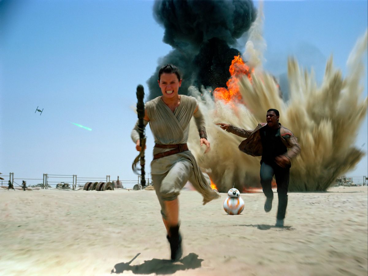 This photo provided by Disney shows Daisey Ridley as Rey, left, and John Boyega as Finn, in a scene from the new film, "Star Wars: The Force Awakens." The film will be available for purchase on Digital HD beginning on April 1, and on Blu-ray and DVD on April 5.  (Disney/Lucasfilm via AP) (AP)