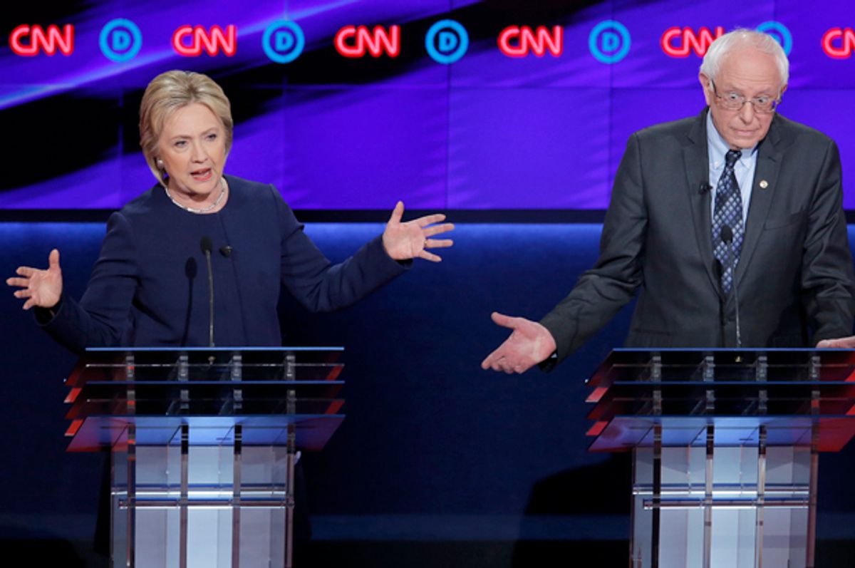 Hillary Clinton and Bernie Sanders at the Democratic U.S. presidential candidates' debate in Flint, Michigan, March 6, 2016.    (Reuters/Jim Young)