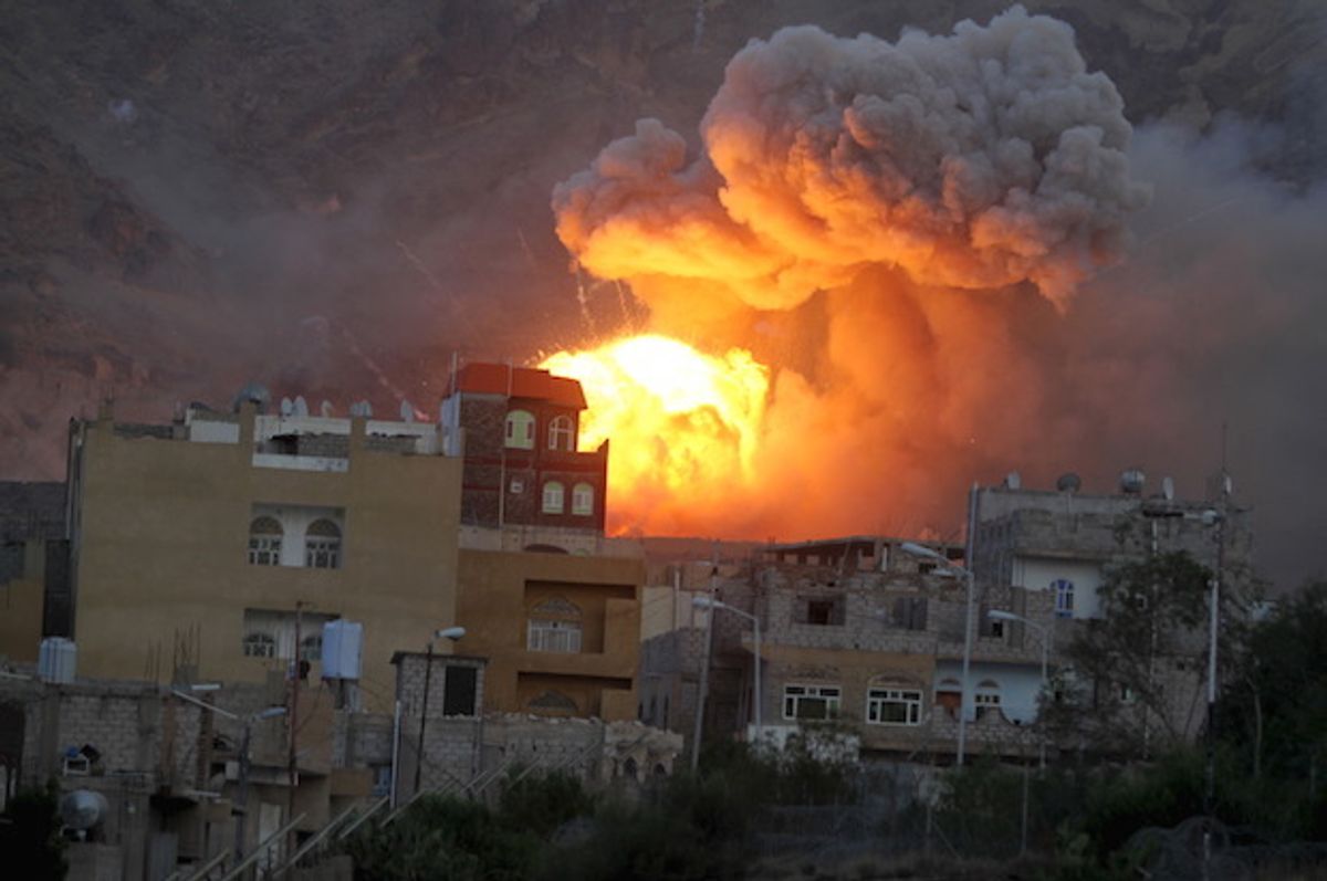 Fire and smoke billows from an army weapons depot after it was hit by an air strike in Yemen's capital Sanaa on May 11, 2015  (Reuters/Mohamed al-Sayaghi)
