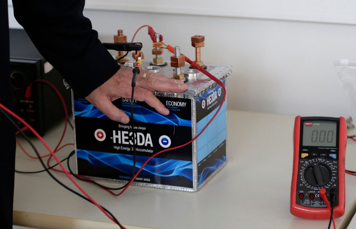 In this picture taken on Wednesday, March 9, 2016, Jan Prochazka, the president of Prague based He3Da company, presents his battery in Prague, Czech Republic. In the global race to create more efficient and long-lasting batteries, some are betting on nanotechnology - the use of minuscule parts - as the most likely to yield a breakthrough. Improving batteries performance is key to the development and success of many much-hyped technologies, from solar and wind energy to electric cars. Research into how to achieve that has followed several avenues, from using different materials than the existing lithium-ion batteries to changing the internal structure of batteries using nanoparticles - parts so small they are invisible to the naked eye. (AP Photo/Petr David Josek) (AP)