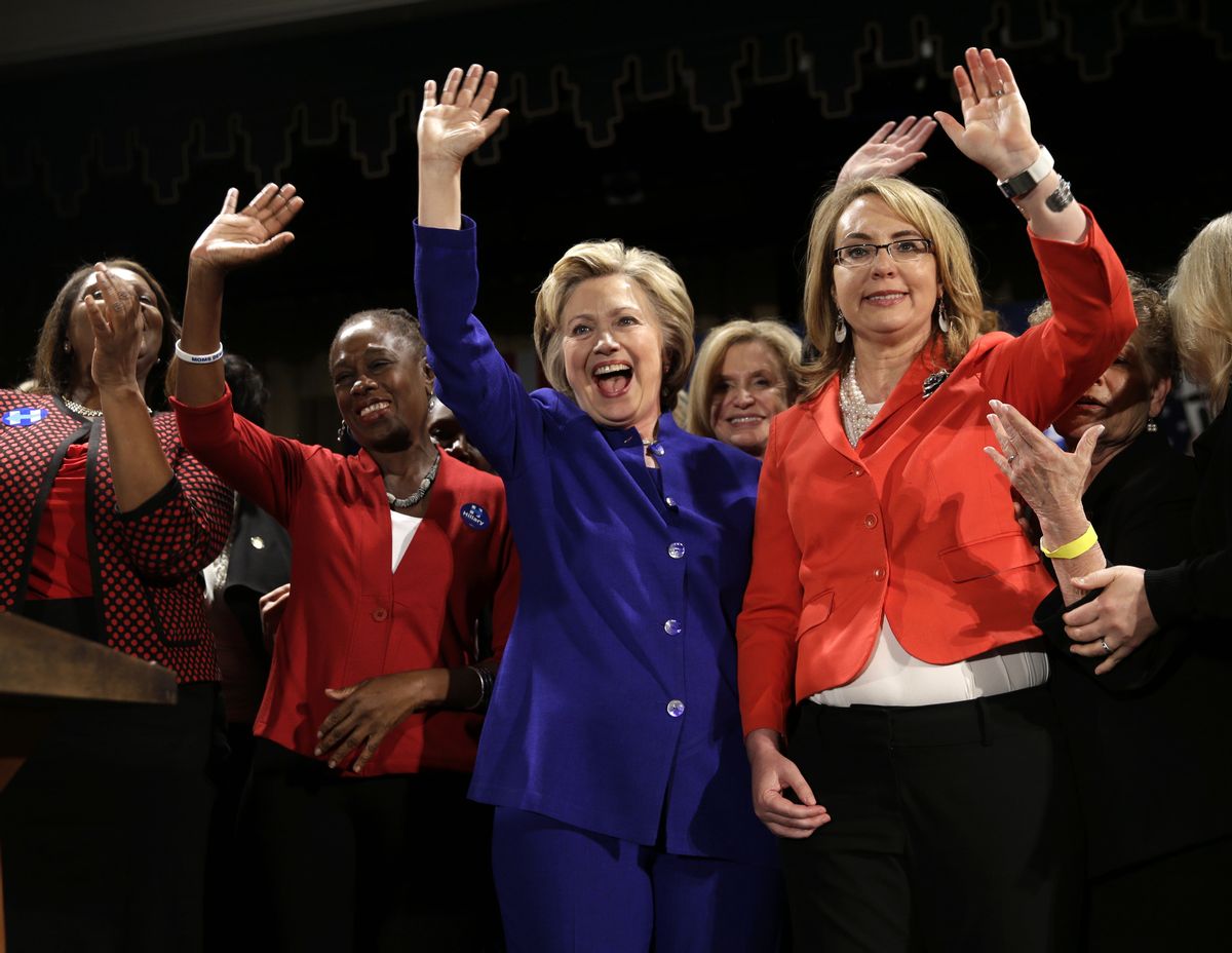 Democratic presidential candidate Hillary Clinton, second from right, waves to the crowd with former Arizona Rep. Gabby Giffords, right, and the first lady of New York City Chirlane McCray during a Women for Hillary event in New York, Monday, April 18, 2016. (AP Photo/Seth Wenig) (AP)