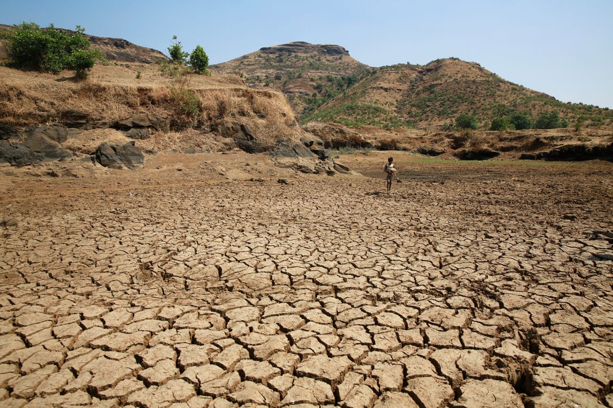 In this April 12, 2016 photo, a dried up pond is seen in Talagoan, 145 kilometres (90 miles) north-east of Mumbai, India. Another year of severe drought has left hundreds of millions reeling in at least 13 Indian states, and experts predict the situation will only worsen as summer stretches on. (AP Photo/Rafiq Maqbool) (AP)