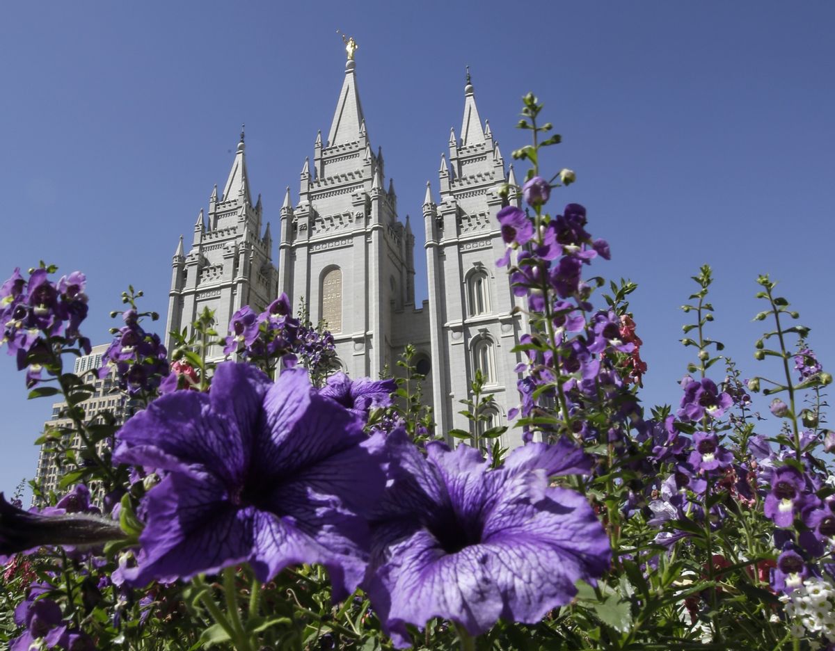 FILE - In this Sept. 3, 2014, file photo flowers bloom in front of the Salt Lake Temple, at Temple Square, in Salt Lake City.  (AP Photo/Rick Bowmer, File) (AP)