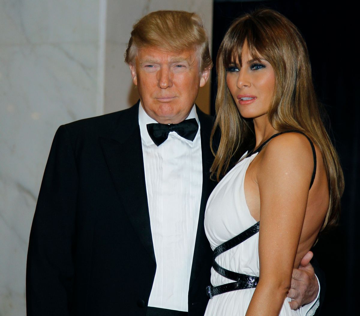 FILE - In this April 30, 2011, file photo Donald Trump, left, and Melania Trump arrive for the White House Correspondents Dinner in Washington. He wont be on Novembers ballot, but President Barack Obama is slowly embracing his role as the anti-Trump, taking on the Republican front-runner in ways that no other Democrat can. Obamas public scolding of Trump, who for years peddled inaccurate claims about Obamas birth certificate, dates back to 2011, when Obama roasted him at the dinner. Trump was visibly humiliated as Obama lobbed joke after joke at him on national television. (AP Photo/Alex Brandon, File) (AP)