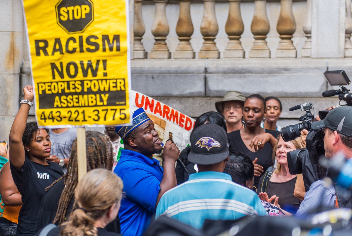 Protesters outside the Freddie Gray trial (Reuters)