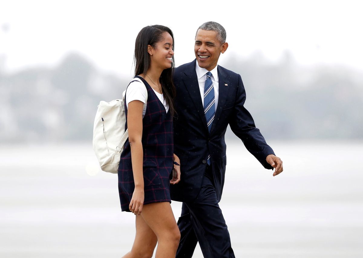 FILE- In this April 8, 2016, file photo, President Barack Obama and his daughter Malia walk from Marine One toward Air Force One at Los Angeles International Airport. Malia is taking a year off after graduating from high school before attending Harvard University as part of an expanding program for students known as a "gap year." (AP Photo/Nick Ut, File) (AP)