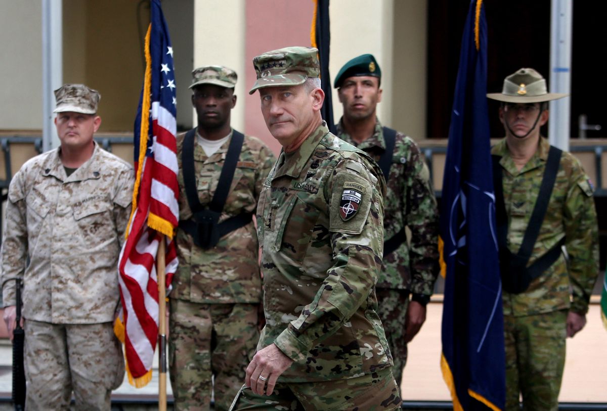 In this Wednesday, March 2, 2016 photo, New U.S. commander in Afghanistan, U.S. Army Gen. John W. Nicholson, attends a change of command ceremony at the Resolute Support Headquarters in Kabul, Afghanistan. The new U.S. commander in Afghanistan has submitted his first three-month assessment of the situation in the war-torn country and what it’s going to take to defeat the Taliban, a U.S. military official tells The Associated Press. (AP Photo/Rahmat Gul) (AP)