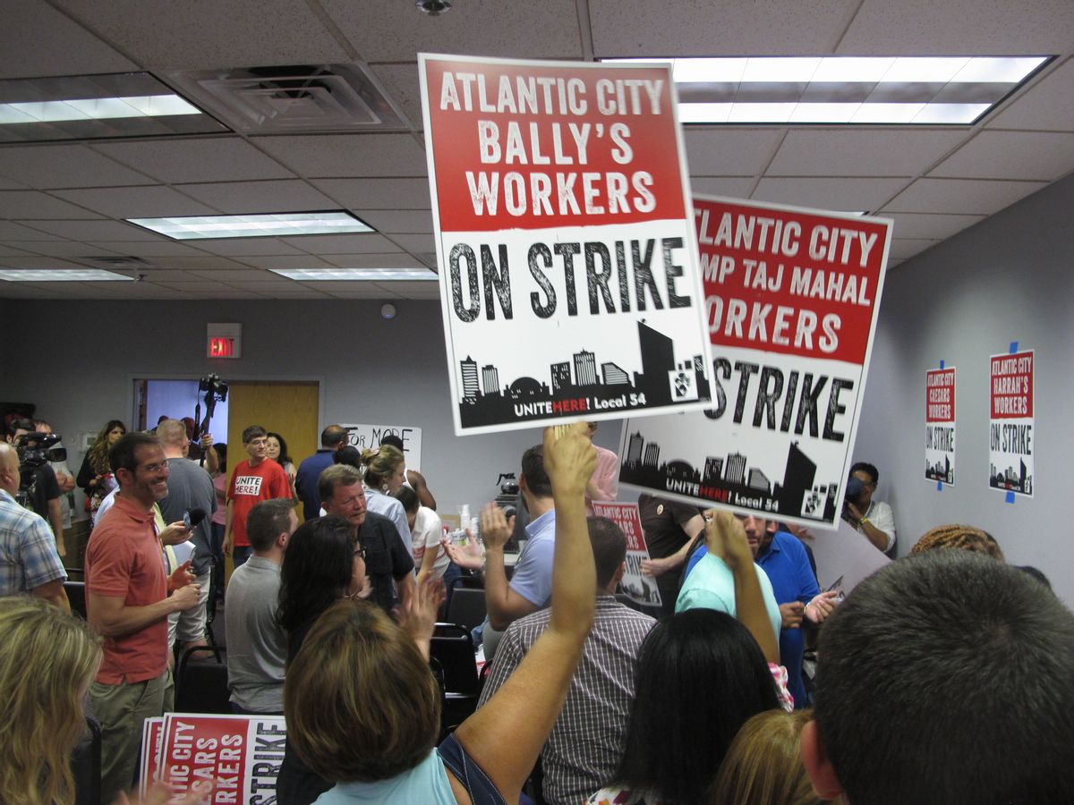 Union members cheer as they discuss preparations for a strike against as many as five of the city's eight casinos in Atlantic City, N.J. on Wednesday June 29, 2016.  (AP Photo/Wayne Parry) (AP)