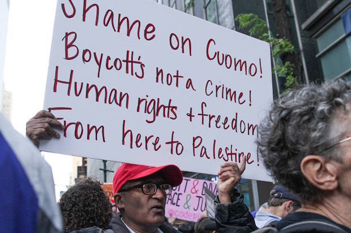 A protester at a demonstration against New York Gov. Cuomo's anti-BDS executive order, in New York City on June 9, 2016  (Jewish Voice for Peace/Jake Ratner)
