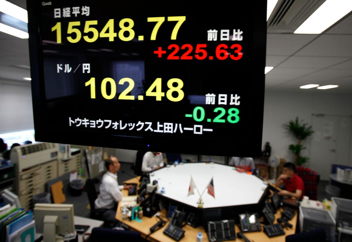 Currency dealers wait for clients' orders under an electronic board showing Nikkei stock index, top, and the exchange rate between US dollars and Japanese yen, bottom, at Ueda Harlow, a foreign exchange trading company in Tokyo Wednesday, June 29, 2016. Asian stock markets rallied on Wednesday following overnight gains on Wall Street and even bigger gains in Europe, as worries about stepping into the era of uncertainty following Britain’s referendum eased. (AP Photo/Shuji Kajiyama) (AP)