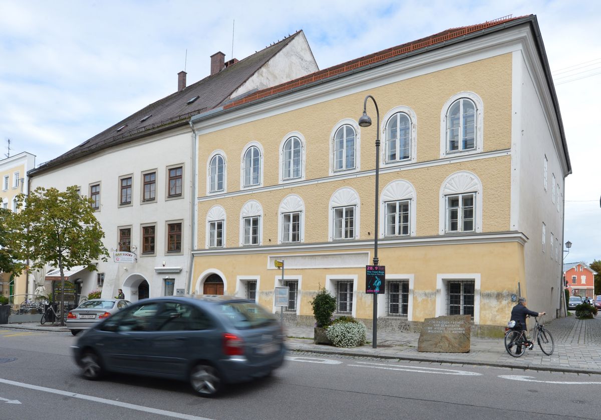 FILE - This Sept. 27, 2012 file picture shows an exterior view of Adolf Hitler's birth house , front, in Braunau am Inn, Austria.   Austria’s Interior Ministry says the government has drawn up a draft law that would dispossess the owner of the house where Adolf Hitler was born. Tuesday’s July 12, 2016  move follows steadfast refusal by house owner Gerlinde Pommer to sell the empty building in the town of Braunau am Inn on the German border. The government has sought ownership so it can take measures to lessen its attraction as a shrine for the Nazi dictator’s admirers.  (AP Photo / Kerstin Joensson,file) (AP)