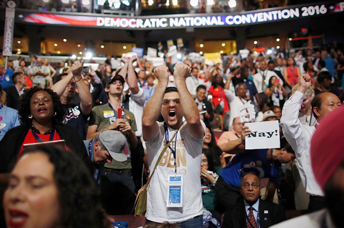 A Bernie Sanders supporter screams during the Convention Rules Committee report at the Democratic National Convention in Philadelphia, July 25, 2016.    (Reuters/Carlos Barria)