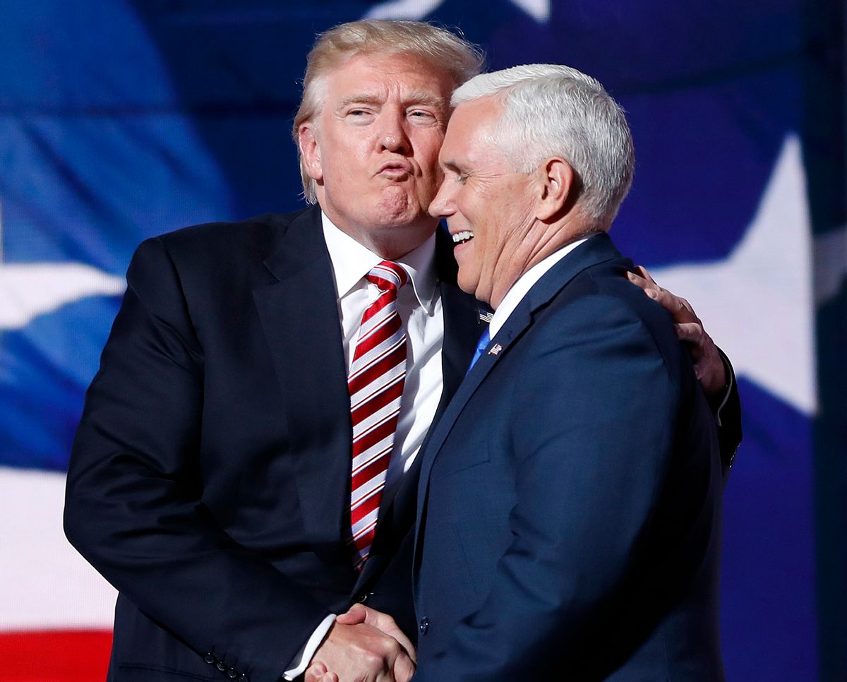 Republican presidential Candidate Donald Trump gives his running mate, Republican vice presidential nominee Gov. Mike Pence of Indiana a kiss as they shake hands after Pence's acceptance speech during the third day session of the Republican National Convention in Cleveland, Wednesday, July 20, 2016. (AP Photo/Mary Altaffer) (AP Photo/Mary Altaffer)