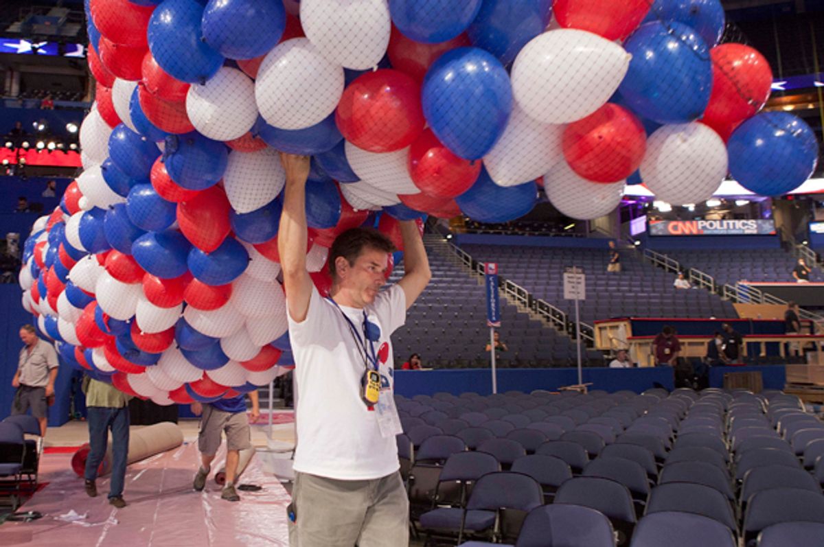 Balloons are carried across the convention floor in preparation for the 2012 Republican National Convention.   (AP/David Ake)