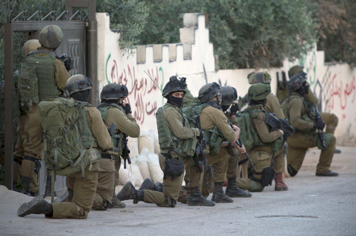 Israeli troops deploy during an army operation at West Bank village of Salem, May 30, 2016.   (AP/Majdi Mohammed)