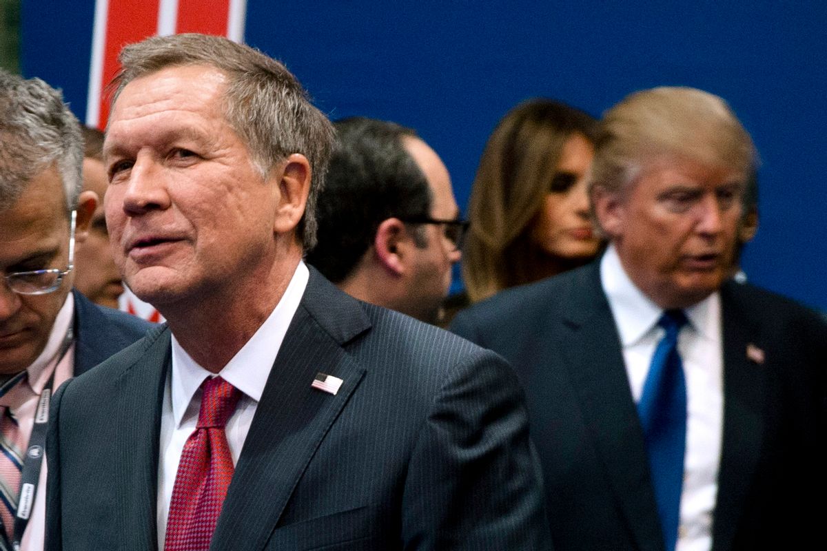 FILE - In this Feb. 6, 2016, file photo, Ohio Gov. John Kasich, left, and Donald Trump, right, speak to reporters after a Republican presidential primary debate hosted by ABC News at Saint Anselm College in Manchester, N.H. While Trump is bypassing the NAACP national convention taking place in Cincinnati from Saturday to Wednesday, July 16 to 20, a Kasich spokeswoman confirmed Friday, July 15, 2016, that the governor will speak to the NAACP on Sunday, July 17 a day before Hillary Clinton's speech to the NAACP and the start of the Republican National Convention in Cleveland. (AP Photo/Matt Rourke, File) (AP)