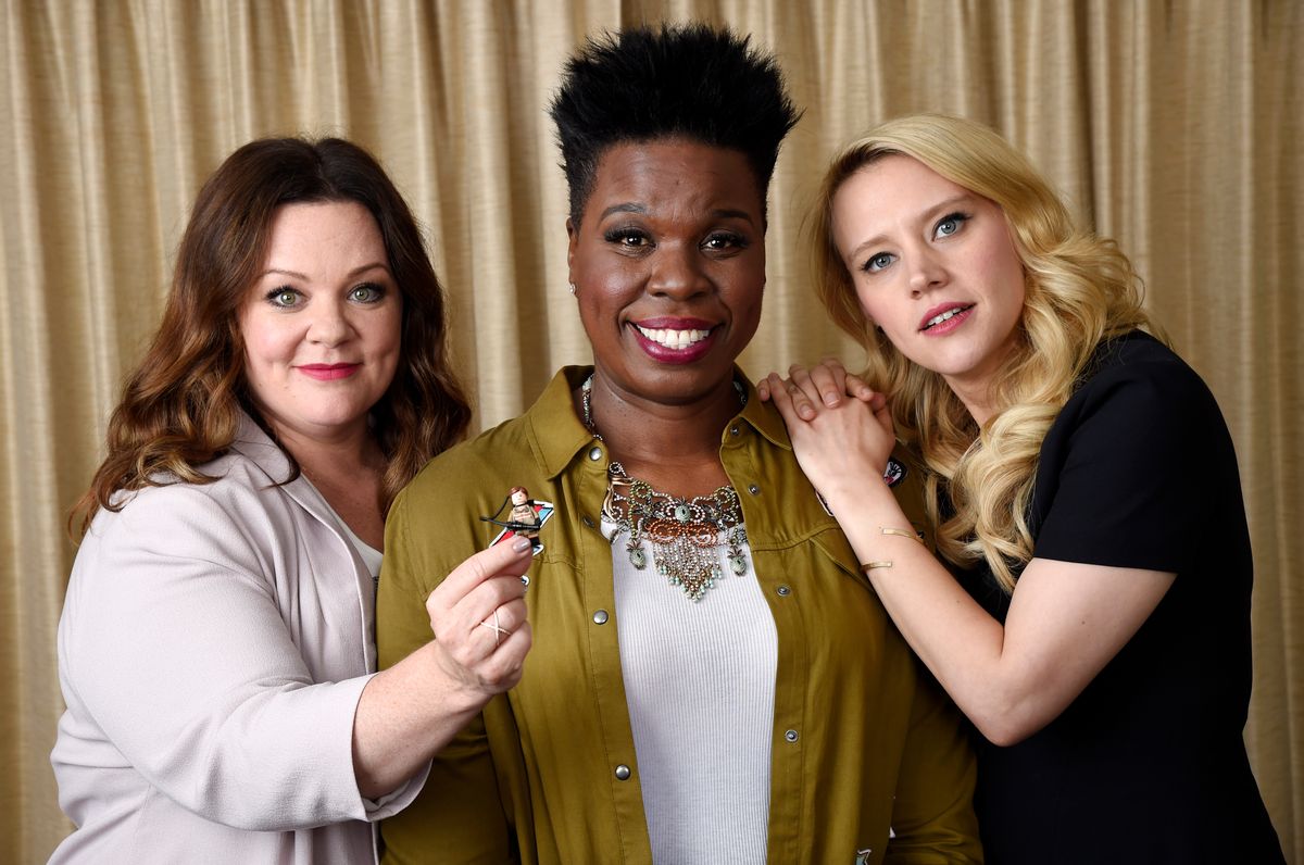 In this July 8, 2016 photo, Melissa McCarthy, left, Leslie Jones, center, and Kate McKinnon, cast members in "Ghostbusters," pose with a Lego toy figure of fellow cast member Kristen Wiig during a portrait session at the Four Seasons Hotel in Los Angeles. Their film will be released on Friday. (Photo by Chris Pizzello/Invision/AP) (Chris Pizzello/invision/ap)