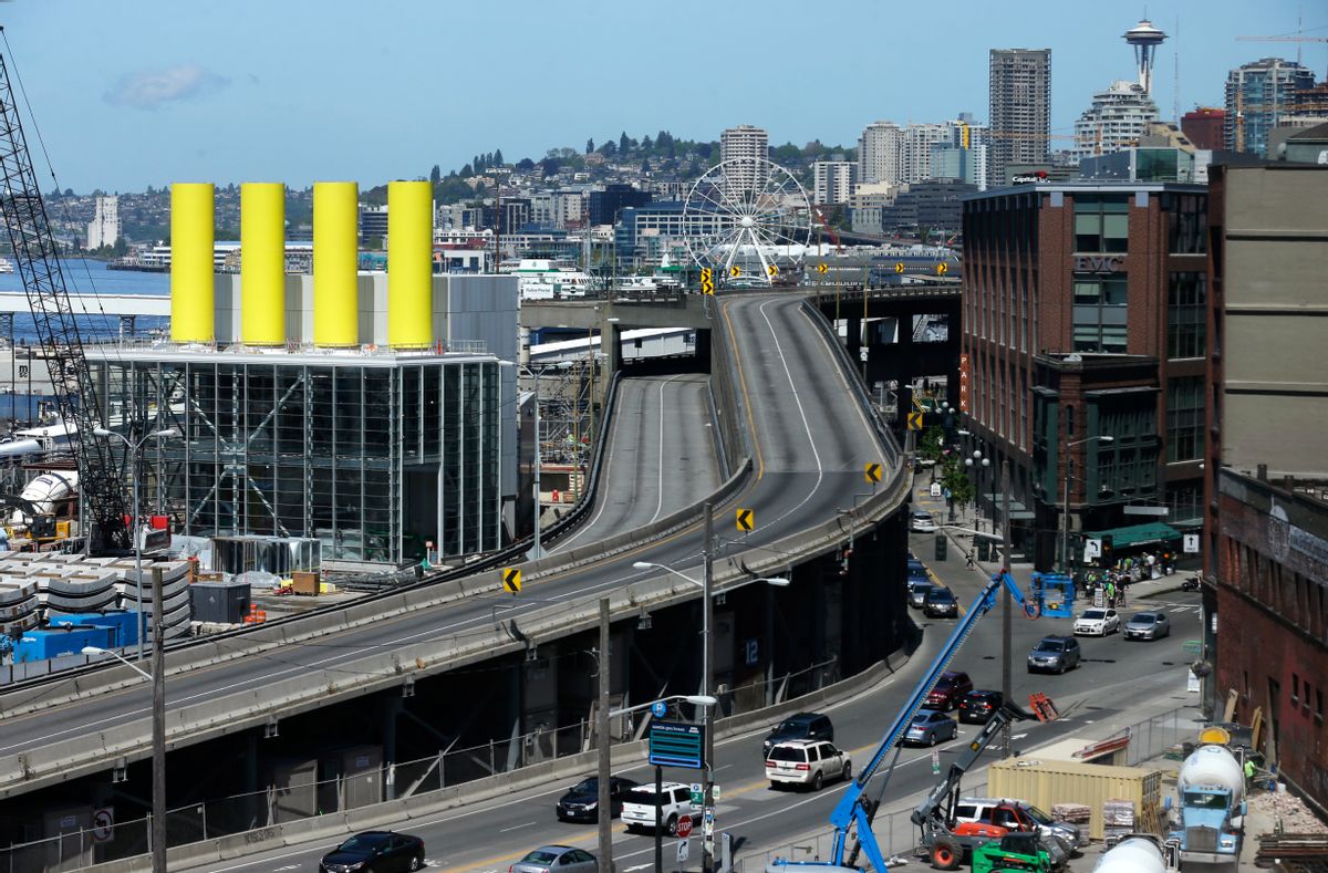 FILE - In this photo taken April 30, 2016, the southern ramps to the Alaskan Way Viaduct in Seattle are shown free of vehicles during a construction closure in Seattle. The troubled project to replace the elevated roadway with a tunnel is $223 million over budget, the Washington state Department of Transportation said Thursday, July 21, 2016. The original completion date for the tunnel was the fall of 2015, but the latest estimate for the opening of the double-decker highway project is in 2018. (AP Photo/Ted S. Warren, File) (AP)