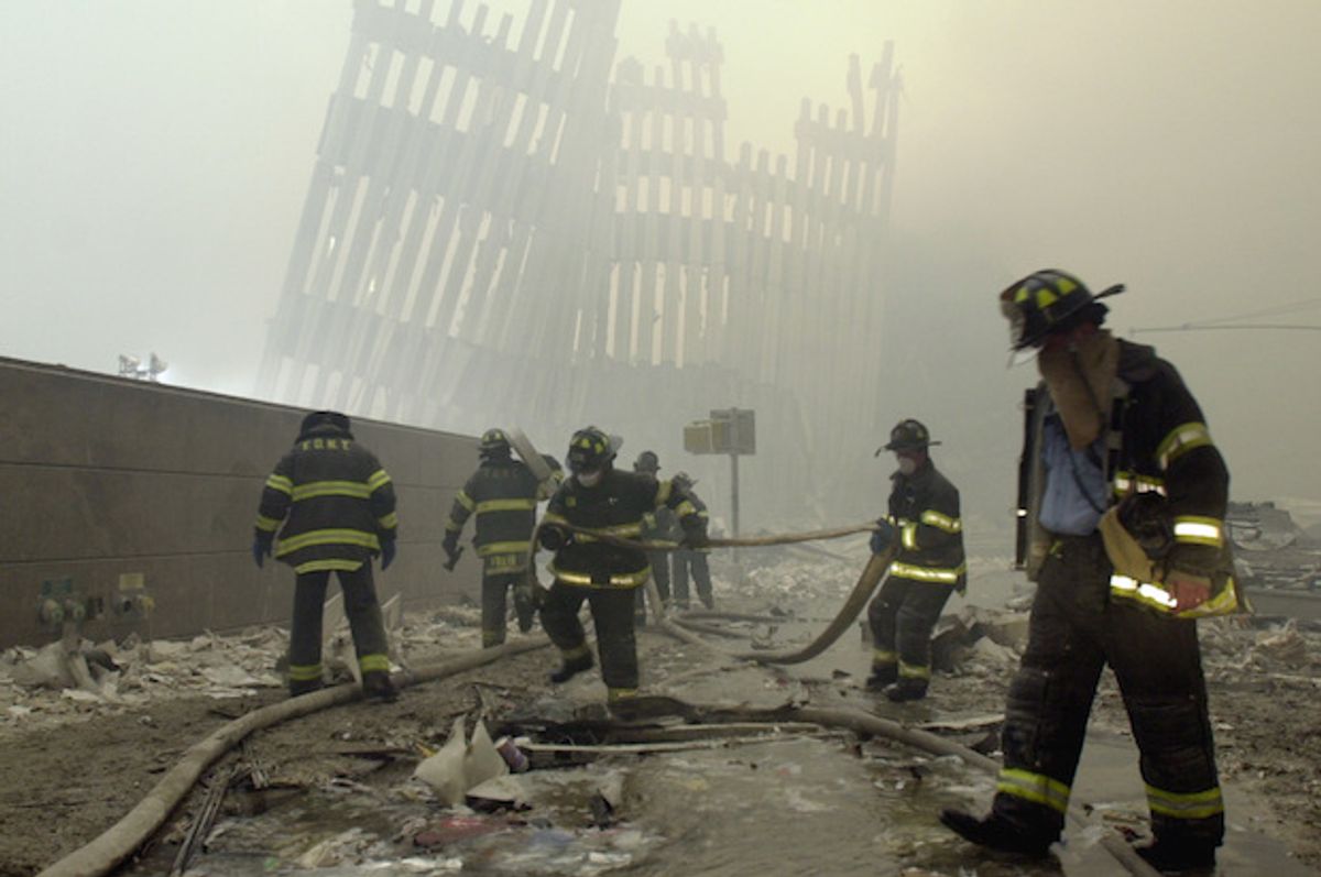 Firefighters at the World Trade Center, after the attacks on Sept. 11, 2001  (AP/Mark Lennihan)