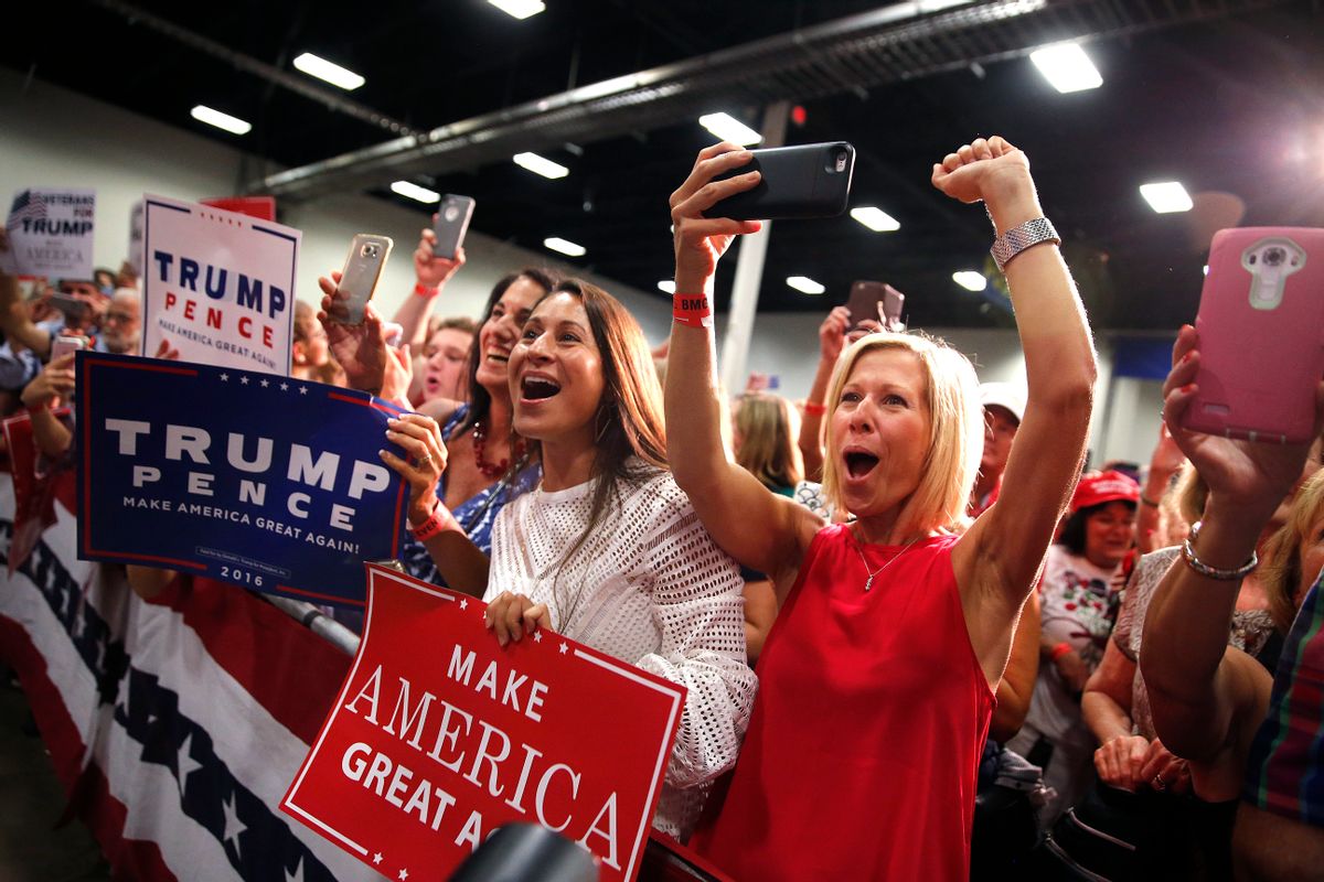 Supporters cheer as Republican presidential candidate Donald Trump arrives to speak at a campaign rally in Fredericksburg, Va., Saturday, Aug. 20, 2016. (AP Photo/Gerald Herbert)