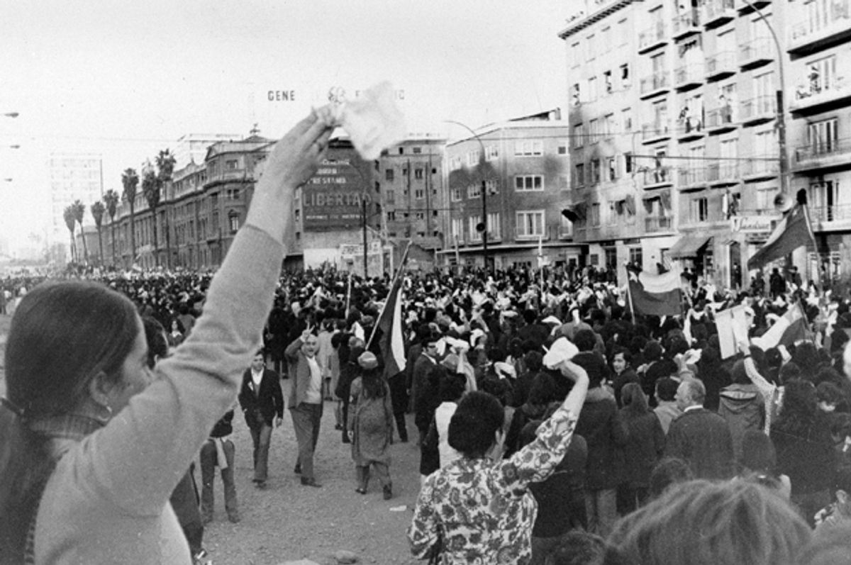 Anti-Marxist women wave white handkerchiefs in Santiago, Chile, Sept. 5, 1973, as they demand the resignation of President Salvador Allende.    (AP)