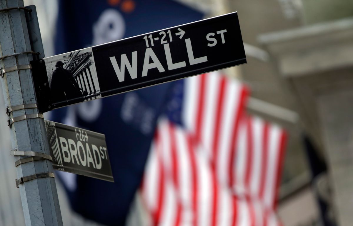 FILE - This Thursday, Oct. 2, 2014, file photo, shows a Wall Street sign adjacent to the New York Stock Exchange. Stocks rose in early trading Friday, Aug. 26, 2016, following two days of declines after Federal Reserve Chair Janet Yellen gave an upbeat assessment on the U.S. economy. (AP Photo/Richard Drew, File) (AP)