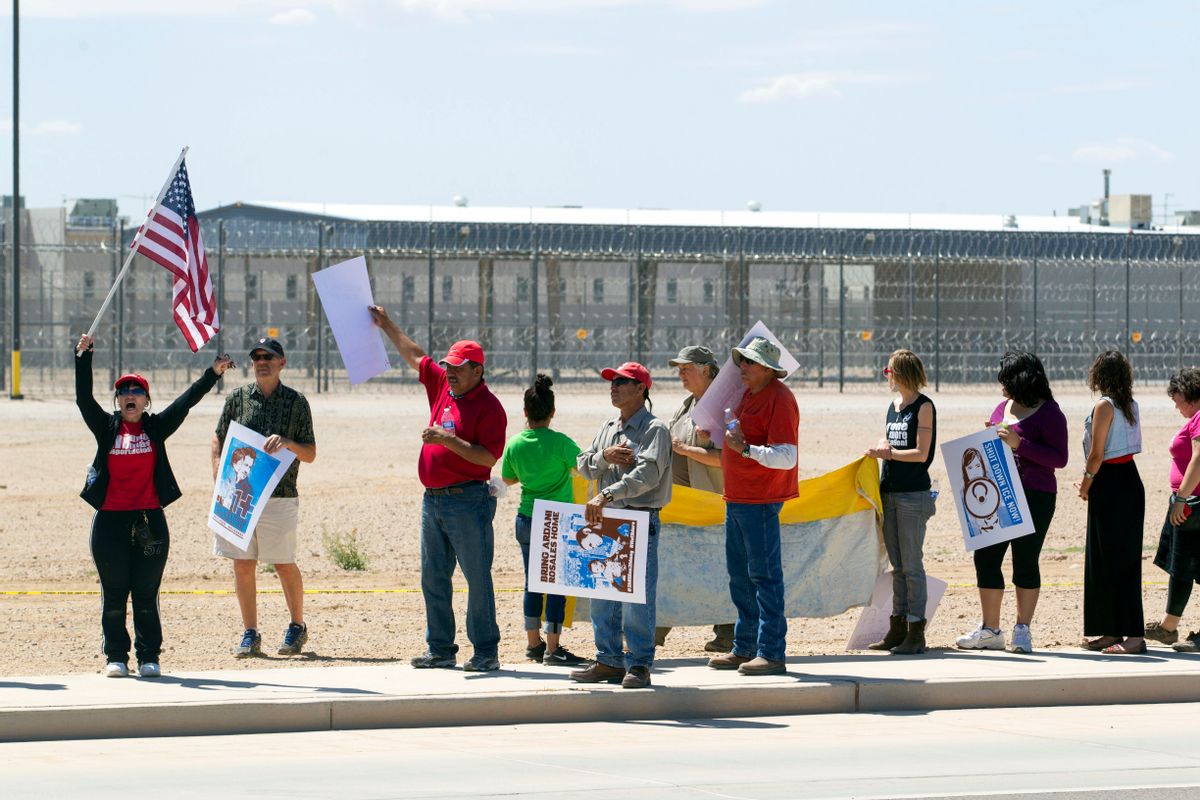 FILE - In this April 5, 2014, file photo, supporters of the immigrant advocacy group, Puente Movement, demonstrate outside the U.S. Immigration and Customs Enforcement detention center in Eloy, Ariz.  (AP)