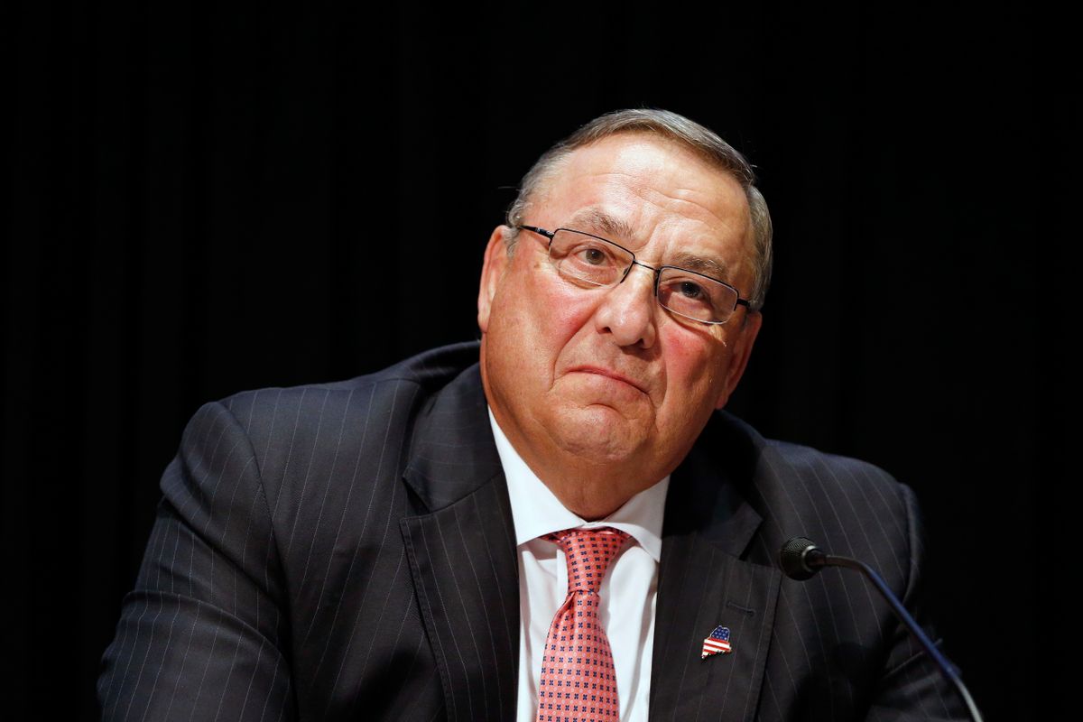 FILE- In this June 7, 2016, file photo, Maine Gov. Paul LePage attends an opioid abuse conference in Boston. LePage is being accused again of making racially insensitive comments, this time by saying photos he's collected in a binder of drug dealers arrested in the state show more than 90 percent of them are black or Hispanic. The governor made the remark at a town hall in North Berwick, Maine, Wednesday, Aug. 24, 2016. (AP Photo/Michael Dwyer, File) (AP)