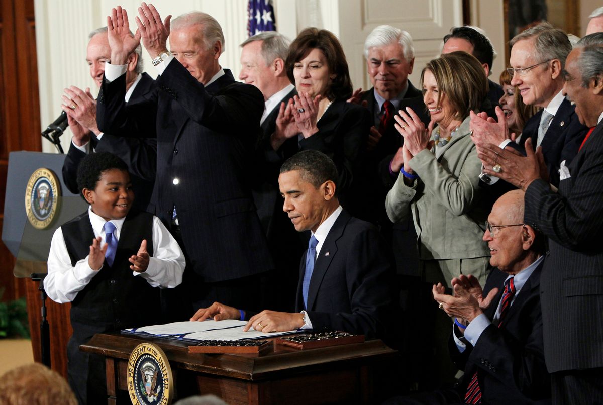 FILE - In this March 23, 2010, file photo President Barack Obama is applauded after signing the Affordable Care Act into law in the East Room of the White House in Washington. (AP Photo/Charles Dharapak, File) (AP)