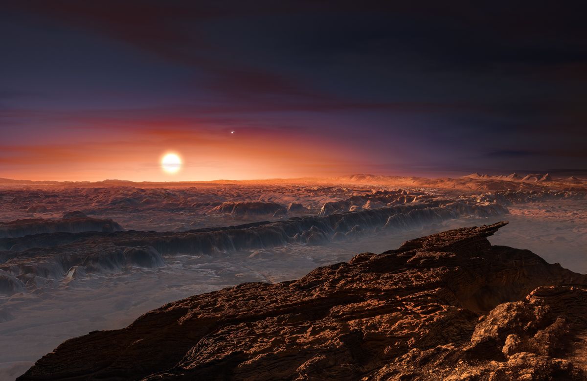 This artist rendering provided by the European Southern Observatory shows a view of the surface of the planet Proxima b orbiting the red dwarf star Proxima Centauri, the closest star to the Solar System. The double star Alpha Centauri AB also appears in the image to the upper-right of Proxima itself. Proxima b is a little more massive than the Earth and orbits in the habitable zone around Proxima Centauri, where the temperature is suitable for liquid water to exist on its surface.  (European Southern Observatory via AP) (AP)
