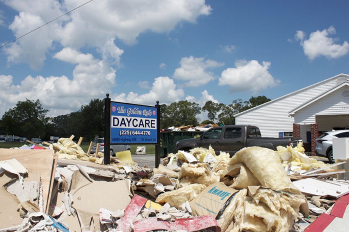 Piles of debris sit outside the Golden Rule Daycare in St. Amant, Louisiana. 140 children attend the daycare, which owners estimate won't reopen for four months.  (Lisa M. O'Neill)