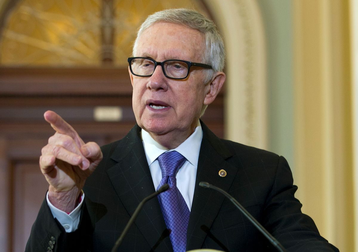 FILE - In this Sept. 14, 2016 file photo, Senate Minority Leader Harry Reid of Nev. speaks during a news conference on Capitol Hill in Washington. Reid lashed out at Donald Trump as a “con artist” after the Republican presidential nominee suggested the lawmaker resume exercising with the equipment that left him blind in one eye last year. (AP Photo/Jose Luis Magana, File) (AP)