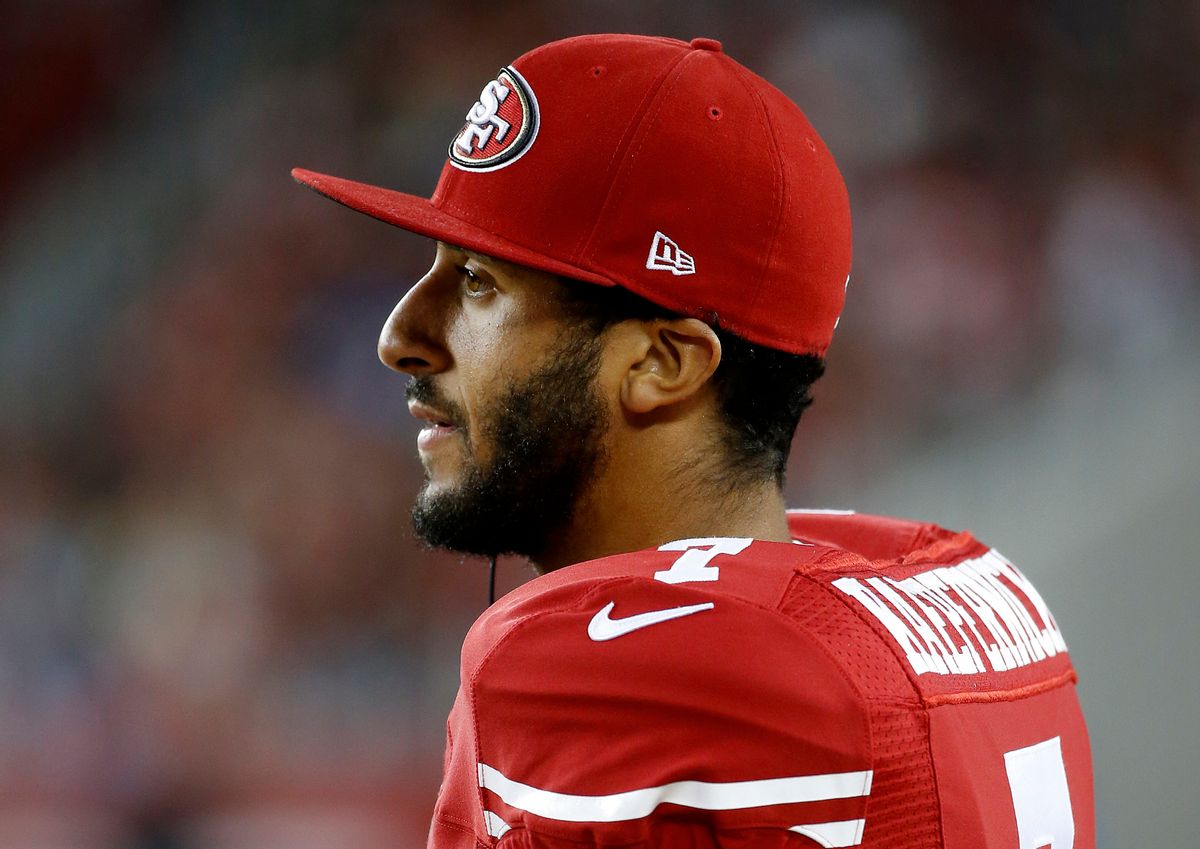 FILE - In this Sept. 3, 2015 file photo, San Francisco 49ers quarterback Colin Kaepernick watches from the sideline during the second half of an NFL preseason football game against the San Diego Chargers in Santa Clara, Calif. Kaepernick's decision this week to refuse to stand during the playing of the national anthem as a way of protesting police killings of unarmed black men has drawn support and scorn far beyond sports.  (AP Photo/Tony Avelar, File) (AP)