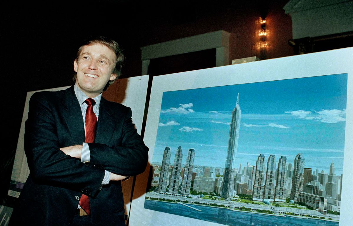 FILE - In this Nov. 18, 1985 file photo, real estate mogul Donald Trump displays an artist's concept of "Television City," which would be on the far west side of Manhattan. (AP)