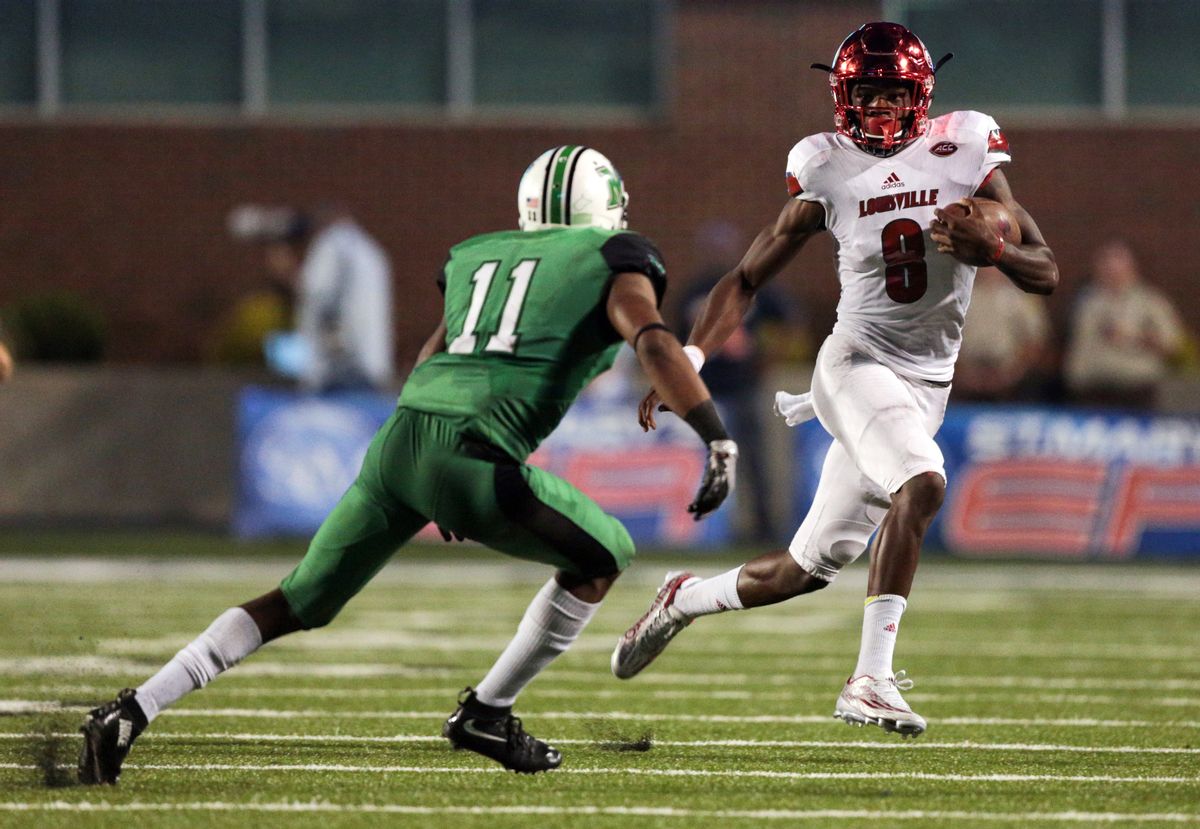 FILE - In this Sept. 24, 2016., file photo, Louisville quarterback Lamar Jackson (8) runs the ball as Marshall's Rodney Allen (11) closes in during the first half of an NCAA college football game in Huntington, W. Va. Third-ranked  Louisville can take a commanding lead in the ACC Atlantic race when play No. 5 Clemson on Saturday. (AP Photo/Walter Scriptunas II, File) (AP Photo/Walter Scriptunas II, File)