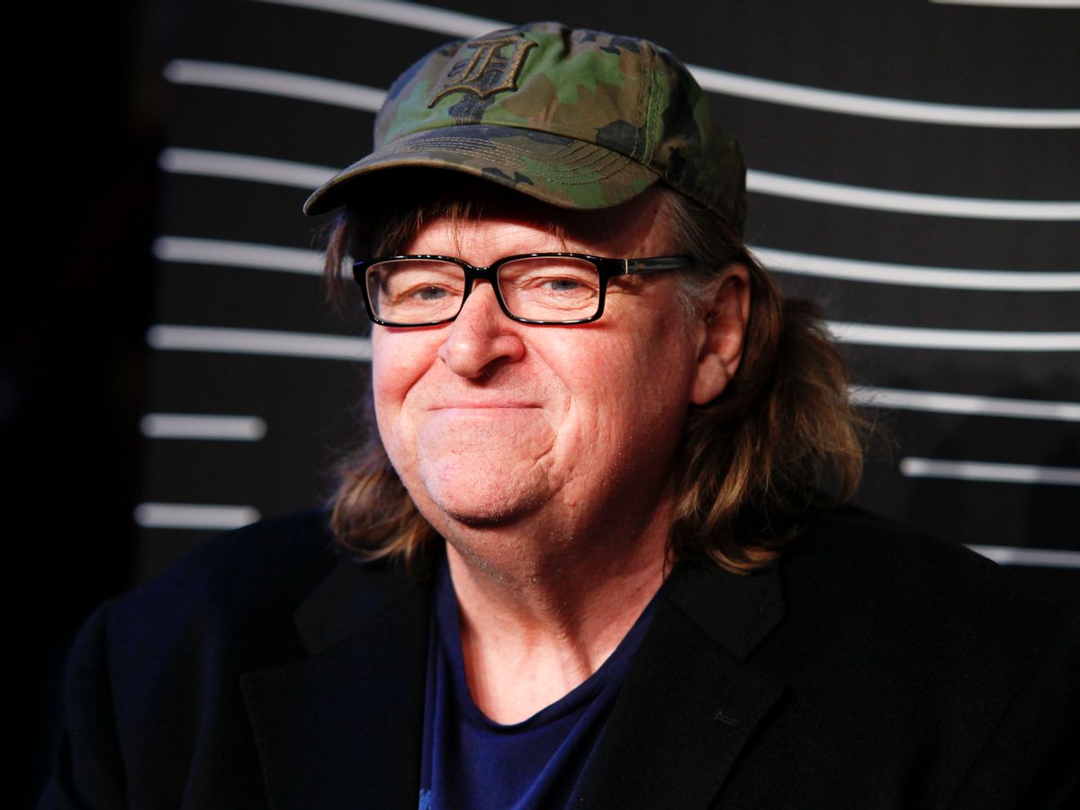 FILE - In this May 16, 2016 file photo, Michael Moore attends the 20th Annual Webby Awards at Cipriani Wall Street in New York. Moore says he's not allowed to perform a one-man show about the presidential race at a central Ohio theater because officials there consider him too controversial. Moore says he will go ahead with his plans for the show at an undisclosed site in southern Ohio in Oct. 2016. (Photo by Andy Kropa/Invision/AP, File) (AP)