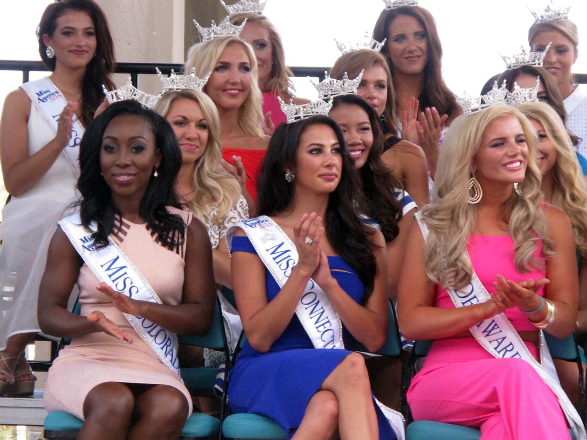 This Tuesday, Aug. 30, 2016 photo shows Miss America contestants at a welcoming ceremony in Atlantic City. The first night of preliminary competition in this year's pageant begins Tuesday night, Sept. 6, 2016, with the new Miss America being crowned on Sunday night. (AP Photo/Wayne Parry) (AP)