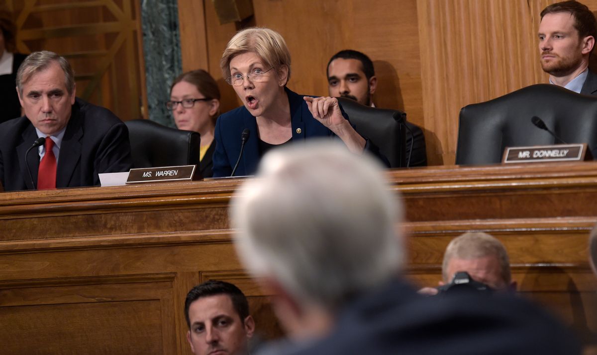 Senate Banking Committee member Sen. Elizabeth Warren questions Wells Fargo Chief Executive Officer John Stumpf, on Capitol Hill in Washington, Tuesday, Sept. 20, 2016, during the committee's hearing.  (AP)