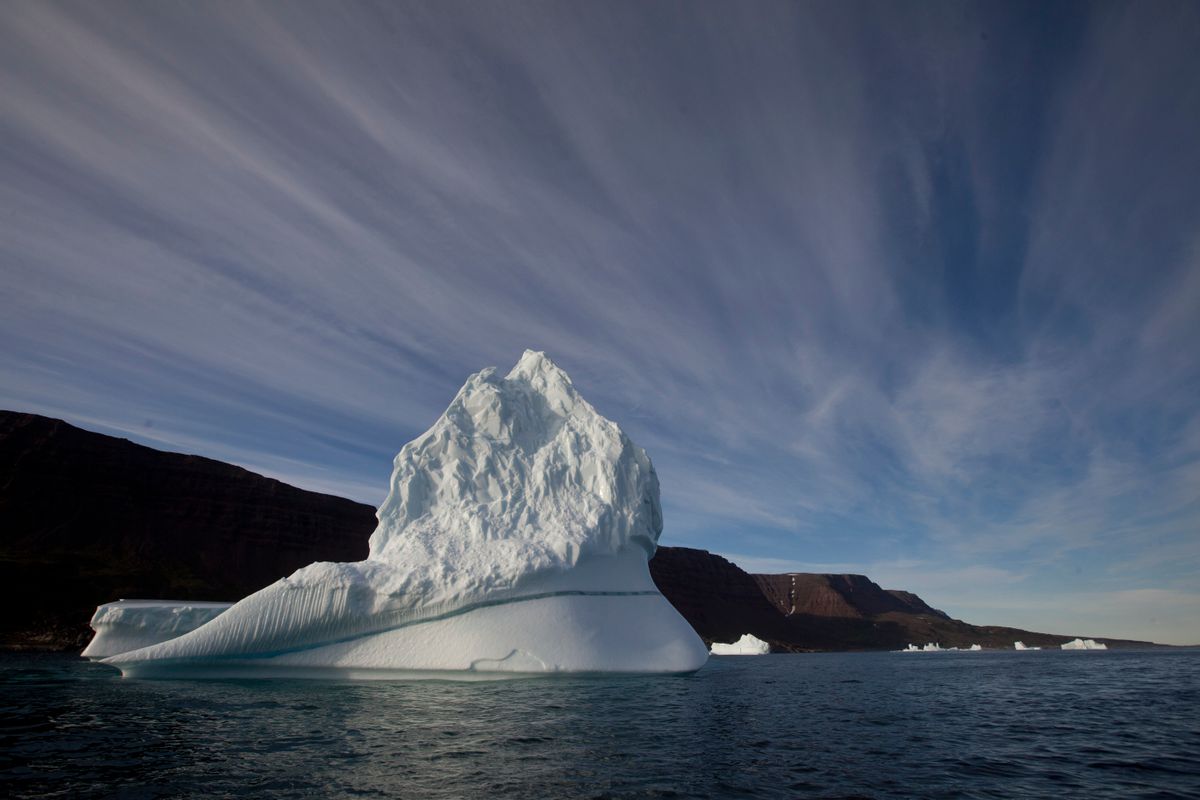 FILE - In this July 21, 2011, file photo, an iceberg floats in the sea near Qeqertarsuaq, Disko Island, Greenland. (AP Photo/Brennan Linsley, File) (AP)